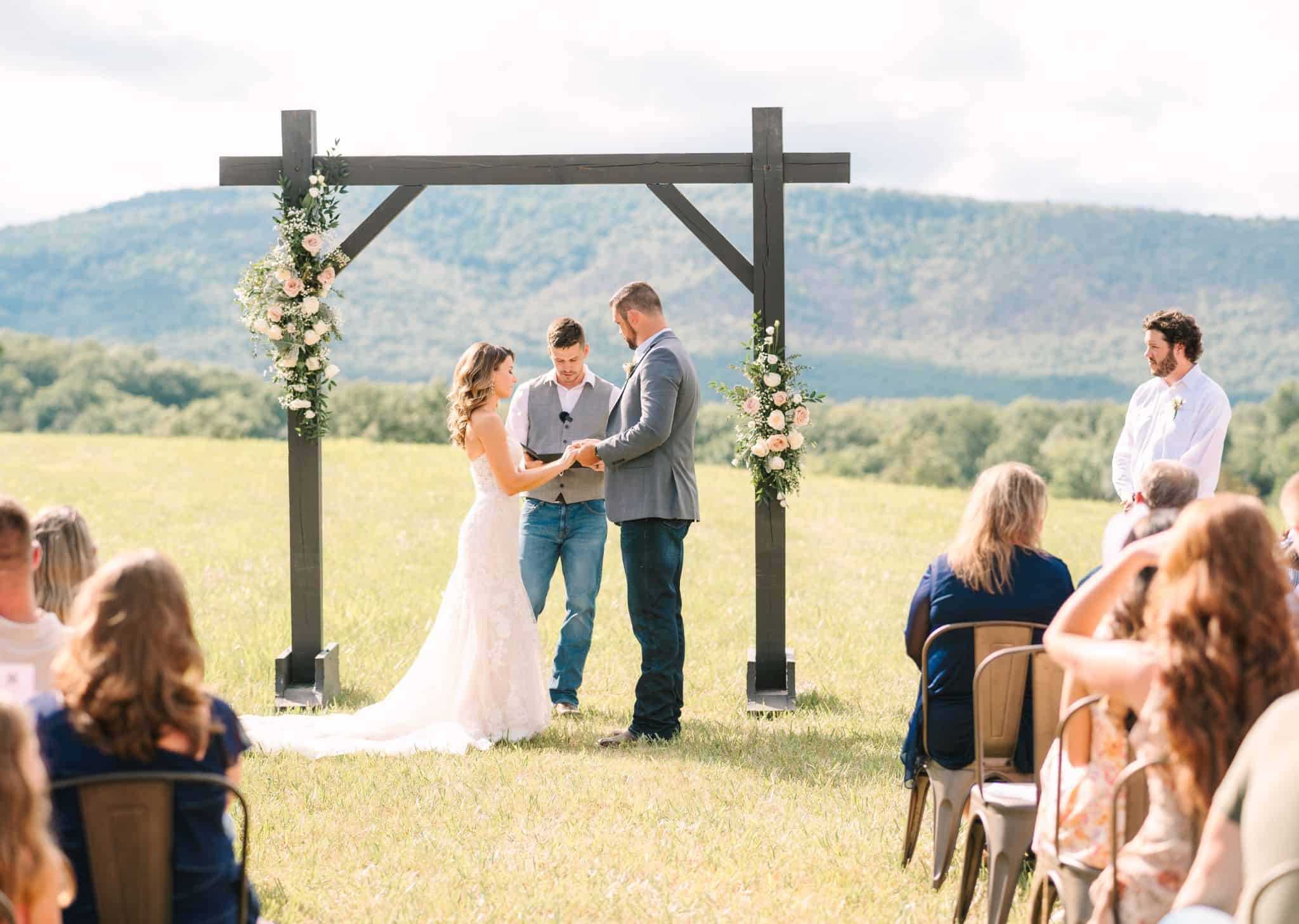 Outdoor wedding ceremony at Canaan Springs wedding venue near Winchester Virginia