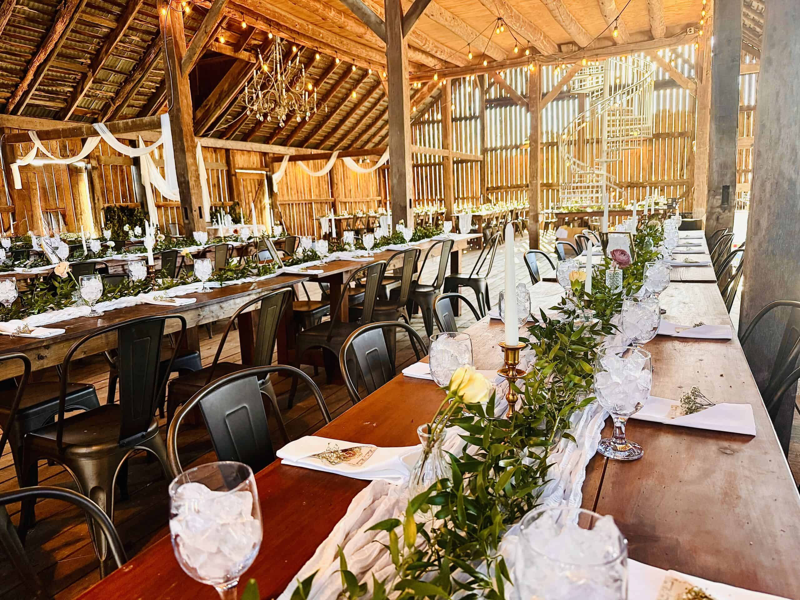 Star Tannery, VA – Canaan Springs wedding venue barn interior showcasing rustic wood architecture, elegant chandeliers, and spacious reception setup in the scenic Shenandoah Valley near Winchester.