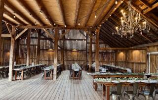 Wide open interior of the historic barn wedding venue at Canaan Springs near Winchester, Virginia, showcasing versatile event space and simple rustic beauty
