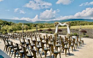 Just married couple at Canaan Springs wedding venue near Winchester, Virginia, celebrating a private farm wedding with mountain views and exclusive venue access