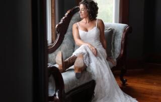 Bride preparing for her wedding day in the historic farmhouse at Canaan Springs, a Northern Virginia barn wedding venue near Winchester, Virginia.